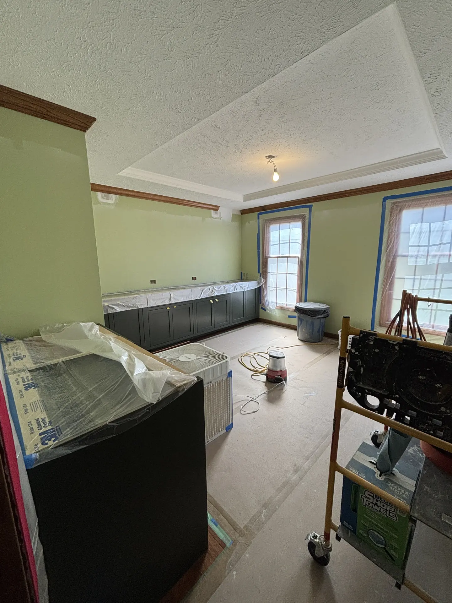Walls painted, cabinetry installation